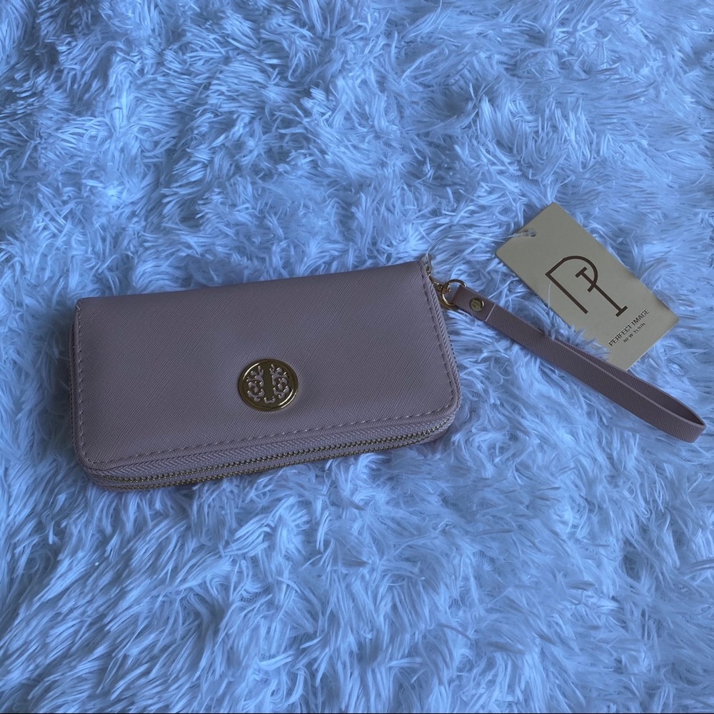 Blush pink wristlet clutch